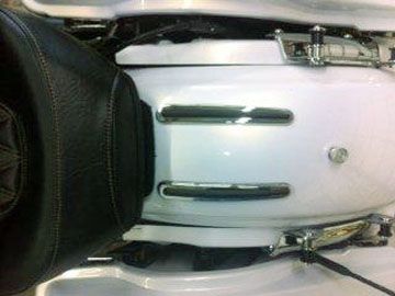 showing two fender strips, need to remove to install the rear seat