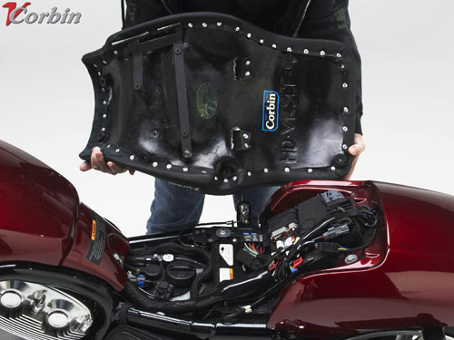 a person holding Dual seat showing the rear side, MPN printed and mounting brackets pre-installed