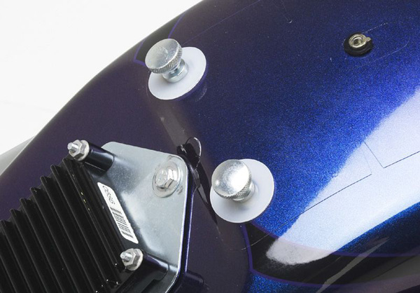 two large thumbscrews shown on fender you will need to remove