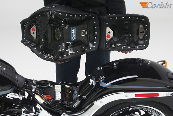 a person holding Hollywood Solo seat showing the rear side with MPN printed and mounting brackets pre-installed