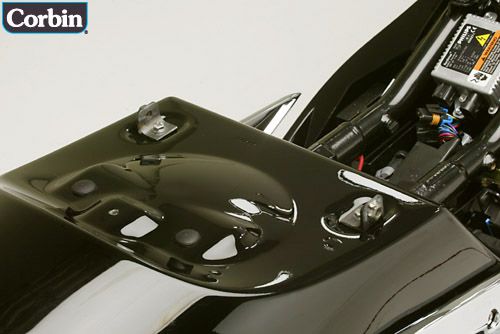 mounting tabs installed into the fender