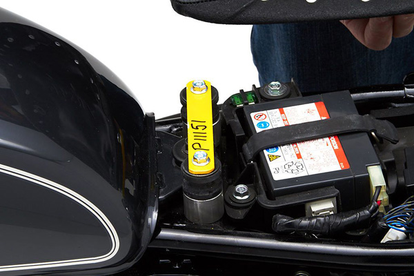 bracket between the stock mounting lugs and reuse the stock bolts, Shown in yellow for illustration purposes only, bracket will arrive painted black