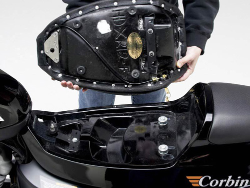 a person is holding Front seat showing rear side MPN printed and keylock system pre-installed