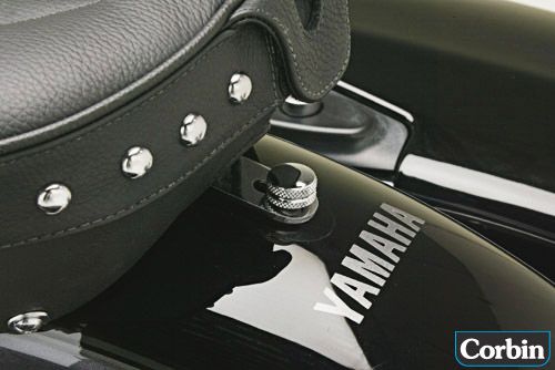 seat attached through chrome tab on the rear fender